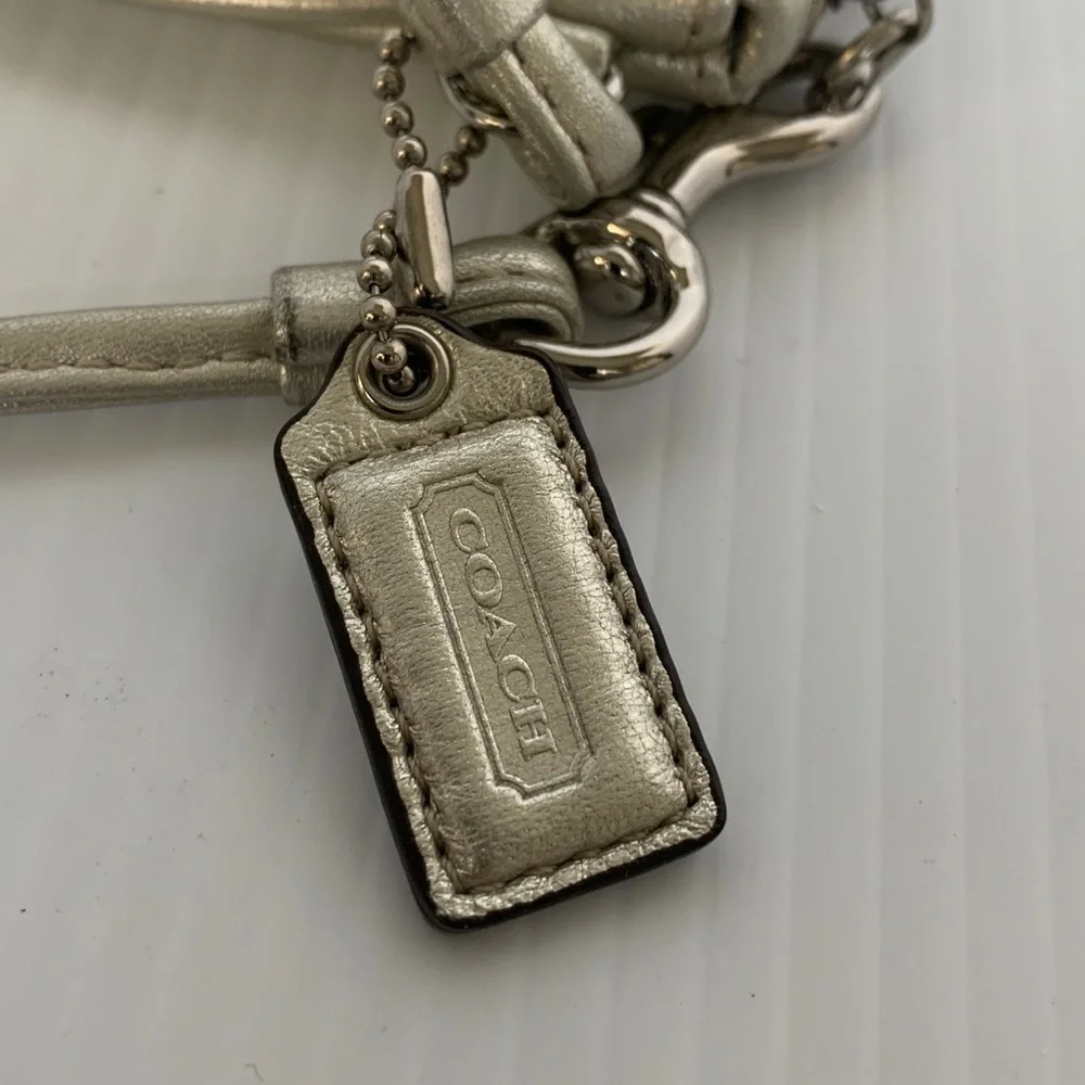 Coach Legacy Stripe Champagne Metallic Wristlet